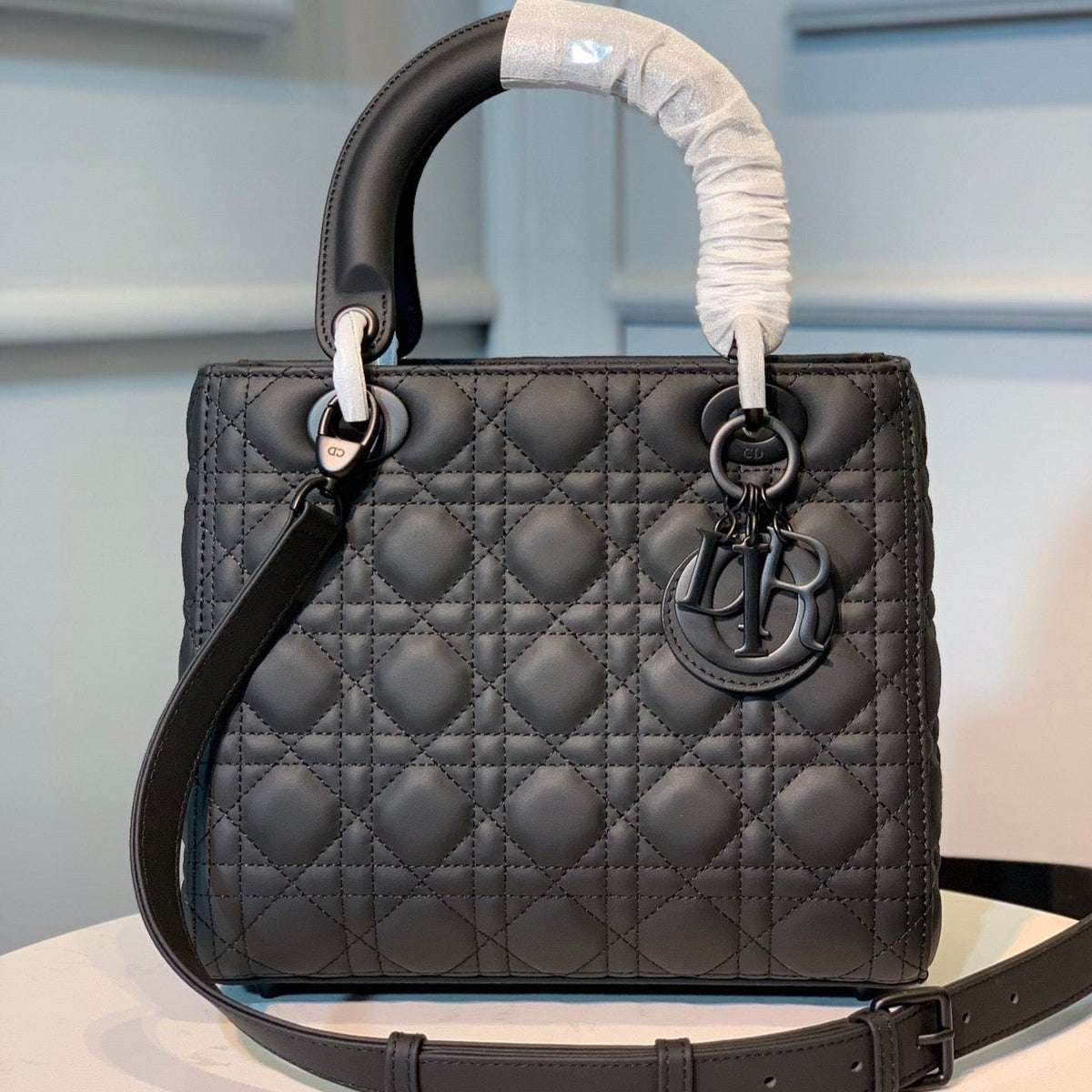 medium lady 24 black calfskin black hardware