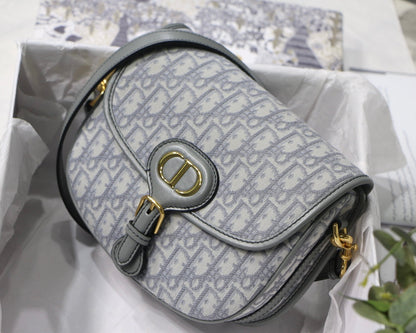 MEDIUM CD BOBBY 22CM GREY OBLIQUE CANVAS GOLD HARDWARE