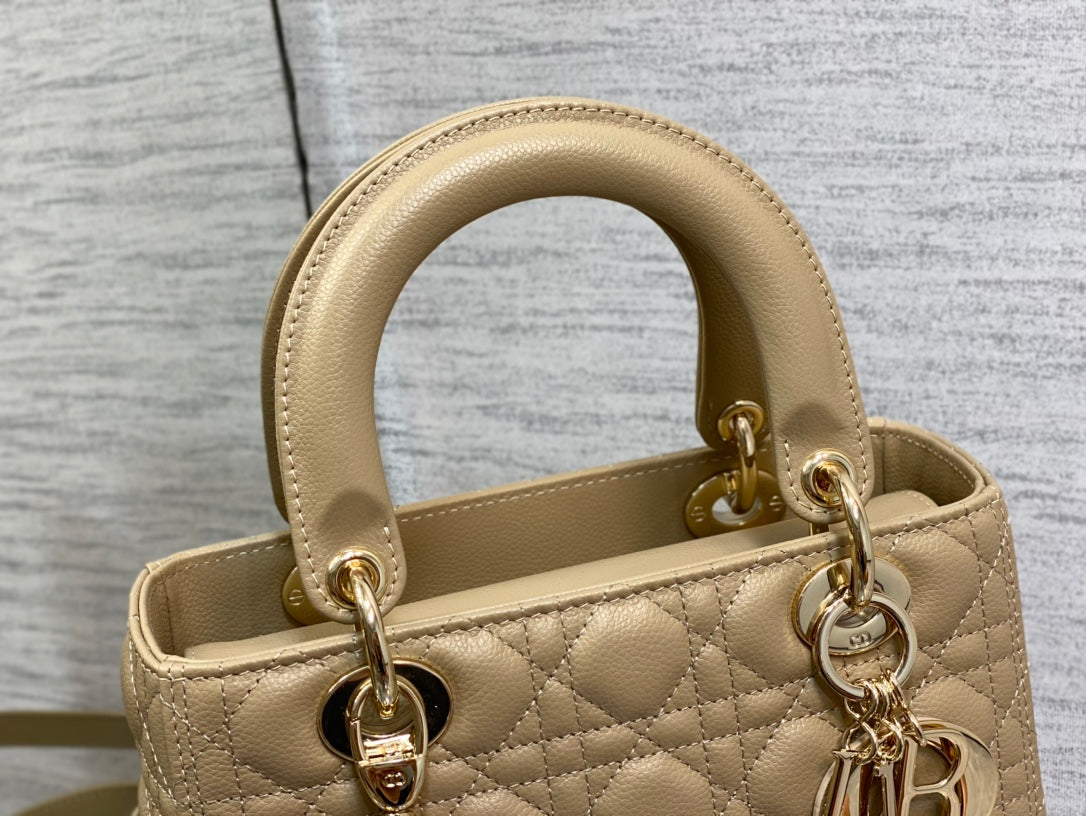medium lady 24 ecru calfskin ghw